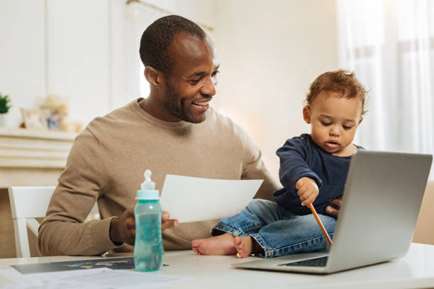 istock Sweet child working with his daddy 901085936