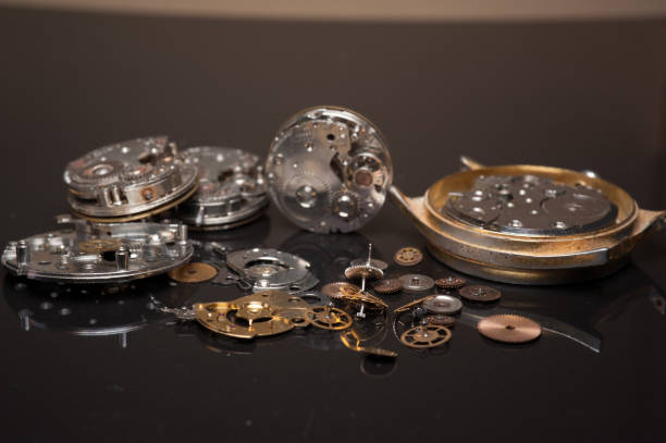 Detail of watch machinery on the table. Detail of watch machinery on the table. handspring stock pictures, royalty-free photos & images
