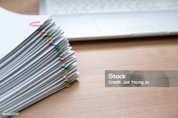 A Pile Of Documents With Copy Space Stock Photo - Download Image Now - Stack, Paper, Stacking