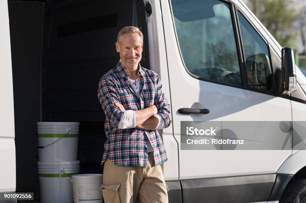 Painter Standing Against Van Stock Photo - Download Image Now - Craftsperson, House Painter, Van - Vehicle