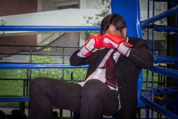 istock Asian businessman with boxing 901092920