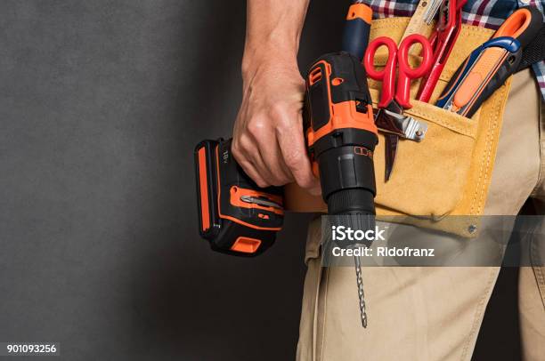 Hand Holding Construction Tools Stock Photo - Download Image Now - Craftsperson, Work Tool, DIY