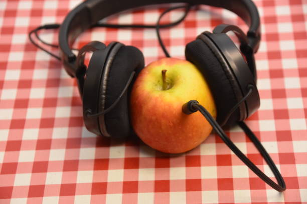 istock Headphones and apple 901093698
