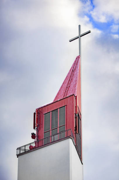 Church  bell tower with the cross. Sventoji, Lithuania.