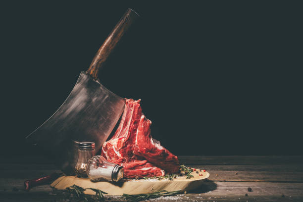 istock raw pork ribs with butcher cleaver and spices 901104816
