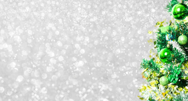 istock Tree and Christmas decorations. Beautiful decorated with present boxes in a winter landscape with snow. 901108772