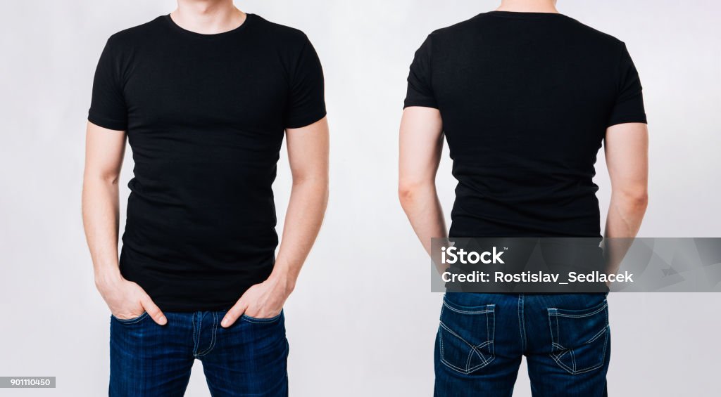 Man in black blank tshirt on gray background T-shirt design - man in black blank tshirt on gray background T-Shirt Stock Photo