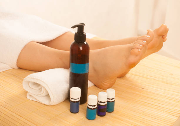 Close-up of female hands doing foot massage