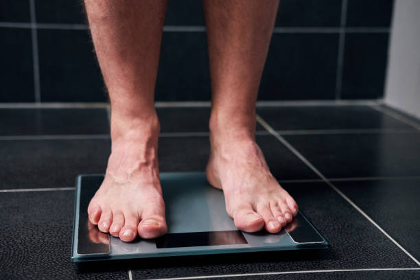 640+ Fat Man Standing On A Weight Scale Stock Photos, Pictures &  Royalty-Free Images - iStock