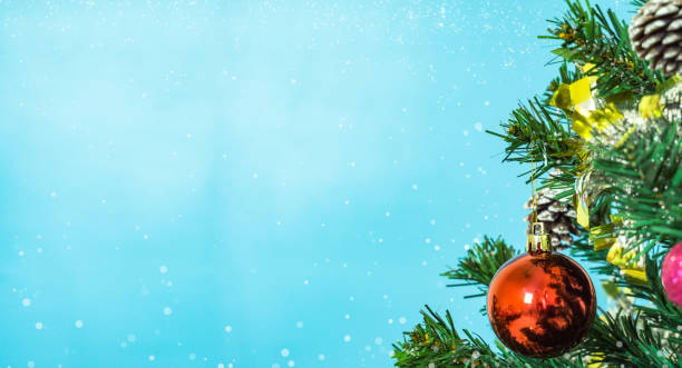 istock Tree and Christmas decorations. Beautiful decorated with present boxes in a winter landscape with snow. 901118506