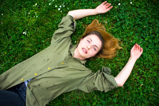 istock Woman on the green grass 901126066