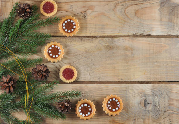 istock Christmas background with spruce branches and cones with cookies 901127280
