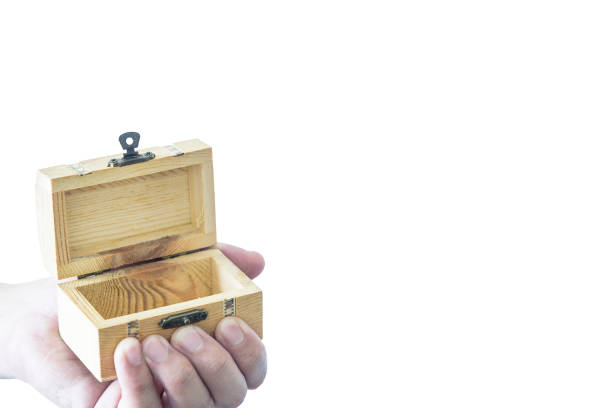istock Man has give a surprise present with empty wooden treasure. Selective focus and isolated and white background concept. 901127454