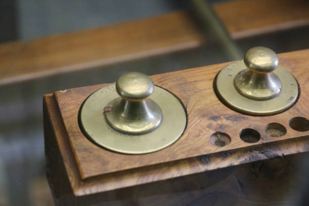 istock weights of a balance 901127524