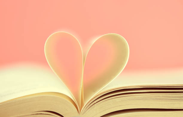 istock Composition of love with open book heart 901130718