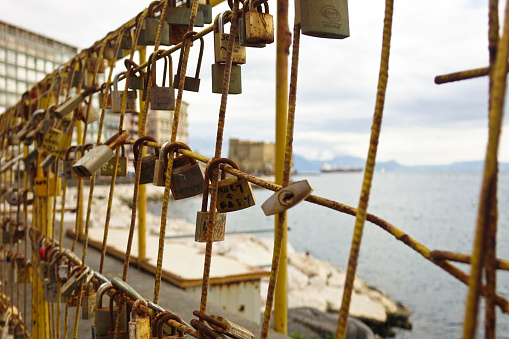 Naples waterfront with castel dell'ovo and padlocks