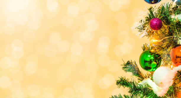 istock Tree and Christmas decorations. Beautiful decorated with present boxes in a winter landscape with snow. 901130874
