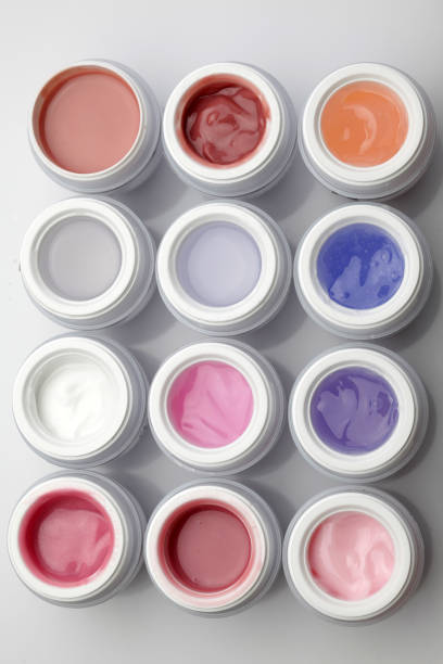 istock jars with nail gel polish in different colors 901134528