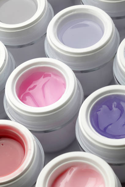 istock jars with nail gel polish in different colors 901134536