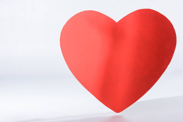 istock simple red heart sign on white 901136828
