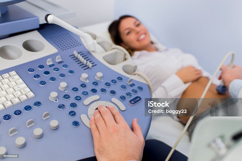 Female patinet have ulstrasound examination of the abdomen in hospital Young female patinet have ulstrasound examination of the abdomen in hospital Gynecologist Stock Photo