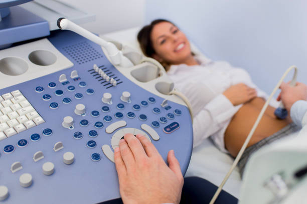 Female patinet have ulstrasound examination of the abdomen in hospital stock photo