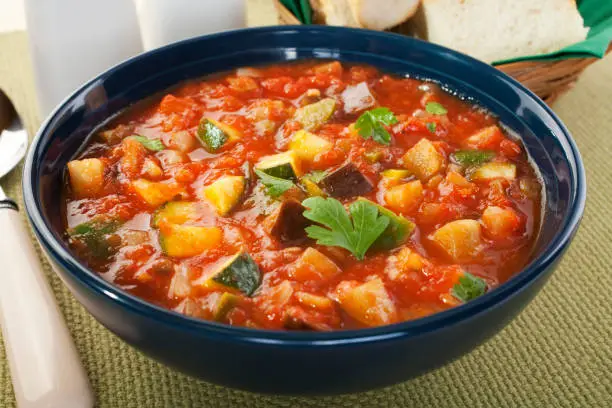 A juicy soup, made from tomatoes, courgettes, capsicums, aubergines, onions and garlic. It's basically ratatouille, with lots of liquid. A wonderful vegetarian lunch with bread.