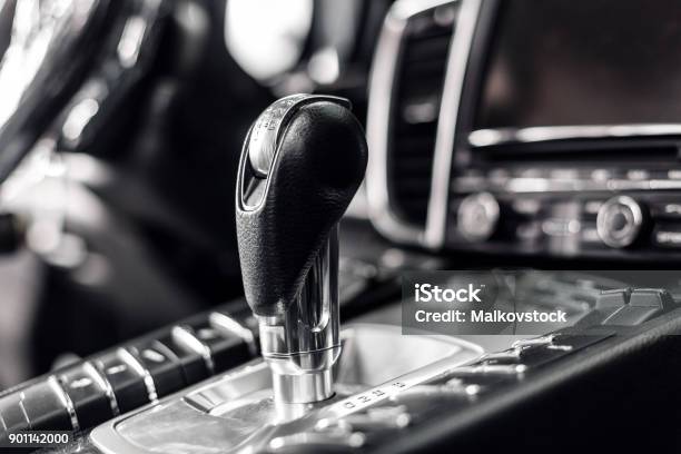 Closeup On Automatic Transmission Lever In Modern Car Multimedia And Navigation Control Buttons Car Interior Details Transmission Shift Stock Photo - Download Image Now