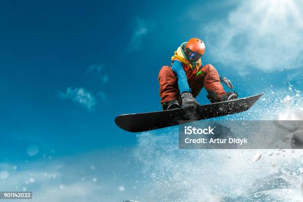 Snowboarding Stock Photo - Download Image Now - Snowboarding, Snowboard, Jumping