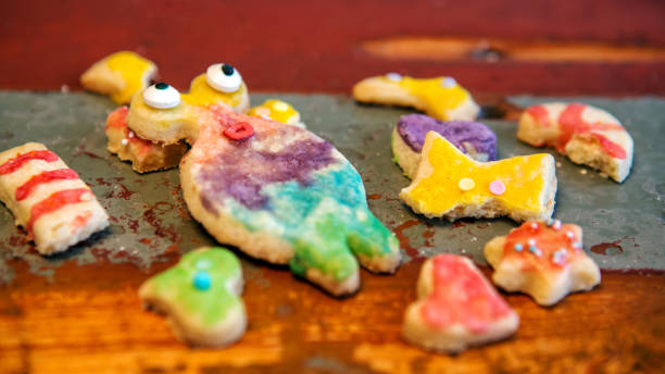 istock funny colorful cookies on rustic wooden table 901146710