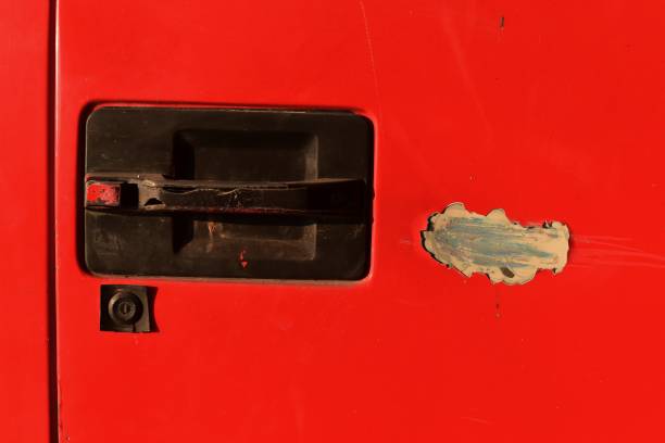 istock scratch on surface red door of truck 901149152