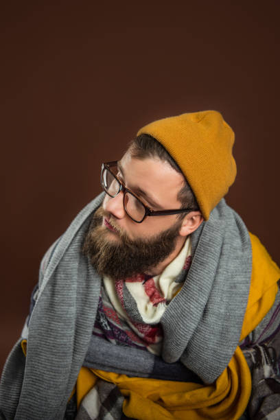 istock Man wrapped in scarfs 901150044
