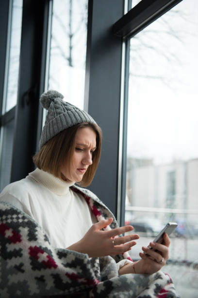 istock Stressed woman looking at smartphone 901152712