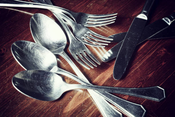 istock old used cutlery  on dark wooden table 901154078