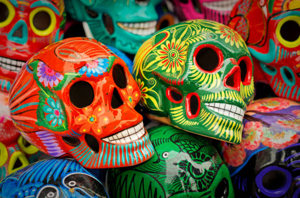 Decorated colorful skulls at market, day of dead, Mexico Decorated colorful skulls, ceramics death symbol at market, day of dead, Mexico day of the dead photos stock pictures, royalty-free photos & images