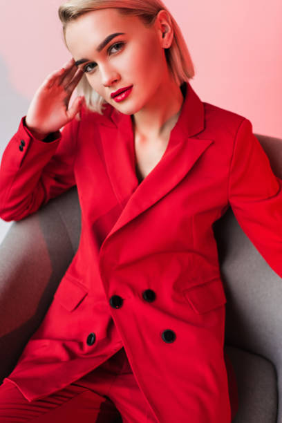 istock woman in red clothes 901157682