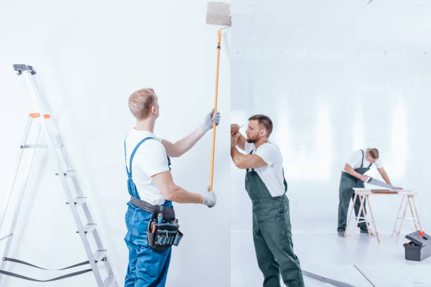 istock Home renovation crew finishing interior 901157718