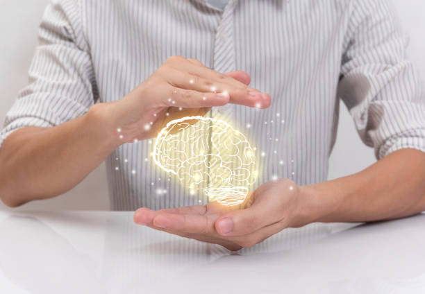 istock hand prevent brain, concept teamwork ideas with innovation and creativity. 901159950