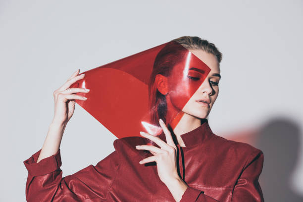 A bold and artistic shot drenched in red tones, evoking intensity, mystery, and modern expression.