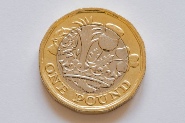 Reverse of the british coin one pound close-up Reverse of the british coin one pound close-up, isolated one pound coin stock pictures, royalty-free photos & images