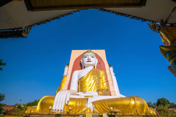 istock Four Faces of Buddha at Kyaikpun Buddha 901162910