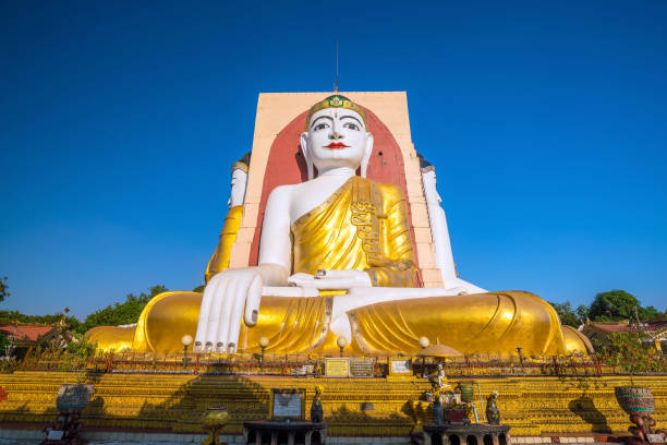 istock Four Faces of Buddha at Kyaikpun Buddha 901162978
