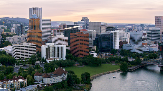 Aerial shot of Portland downtown from waterfront of Willamette River, Oregon, USA.