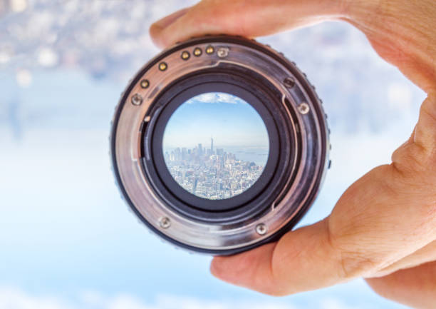 istock Lens image dslr manhattan downtown city new york hand 901169616
