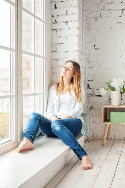 istock Young Woman Resting at Home 901178698