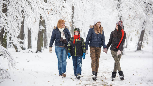 istock Family enjoying in snow 901179158