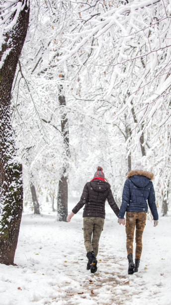 istock Young women enjoying in snow 901182388