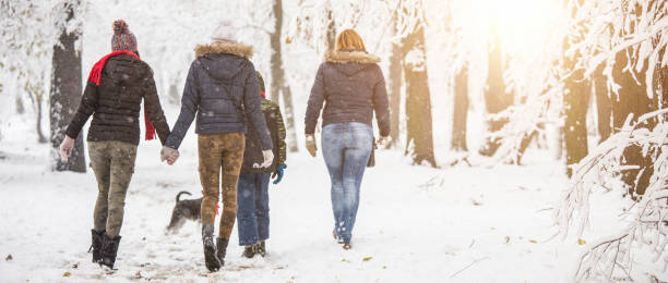 istock Family enjoying in snow 901182674