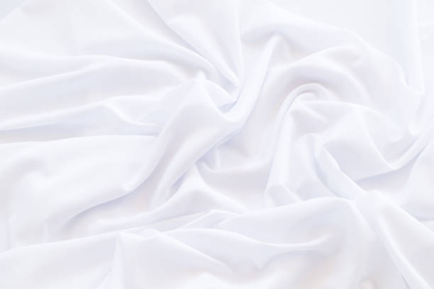 istock White fabric background and texture, Crumpled of white satin for abstract 901187536