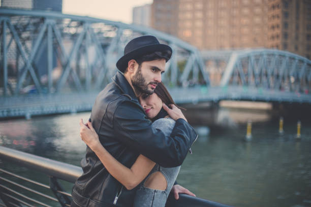 istock Love couple enjoying by the river 901191576